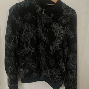 Black bomber jacket with floral detailing